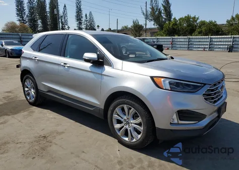 2022 Ford Edge Titanium z USA, uszkodzony, nr VIN 2FMPK4K94NBA30700
